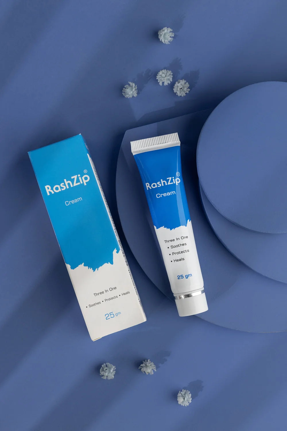 Top view of RashZip Cream 25 gm box and tube